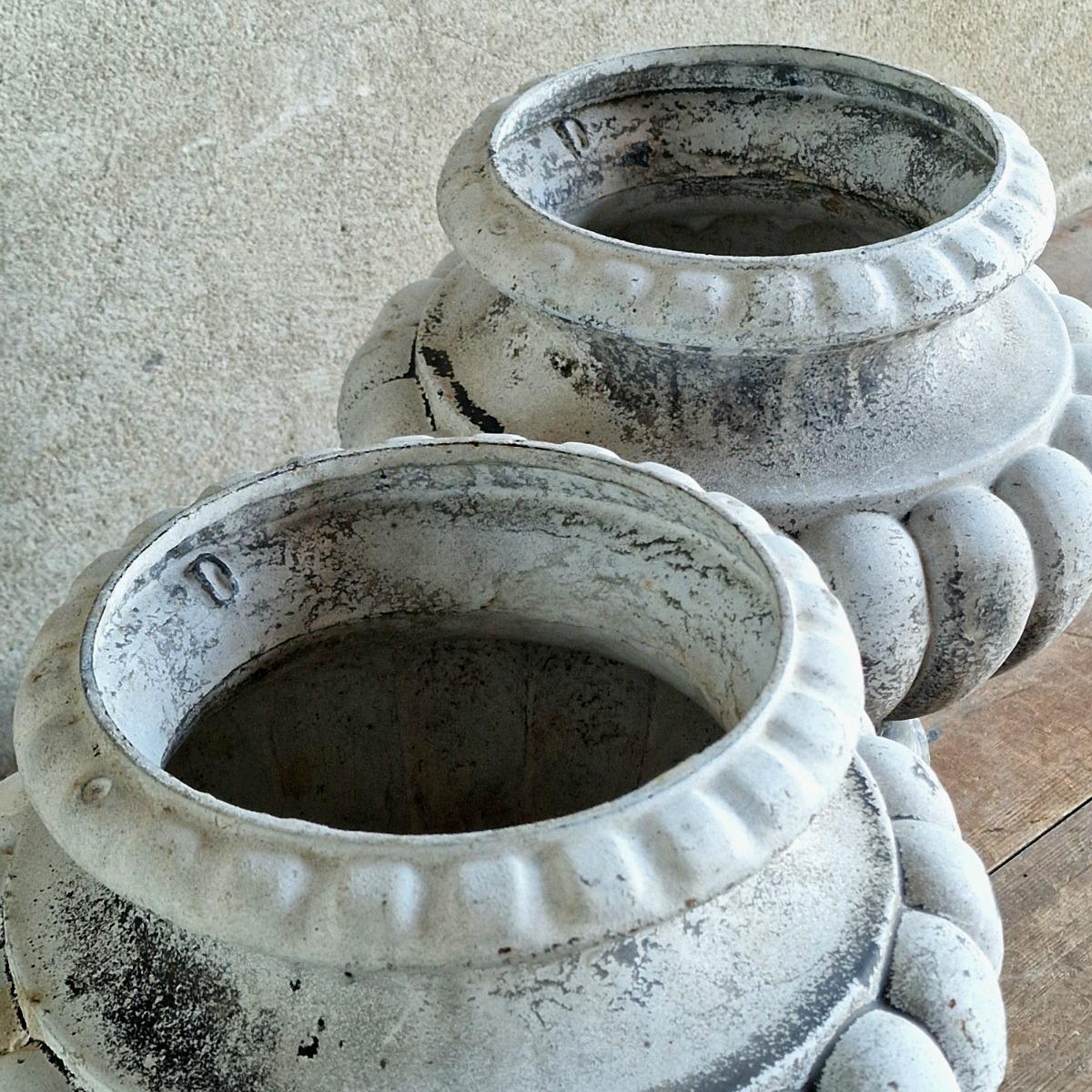 Pair of enameled cast iron planters