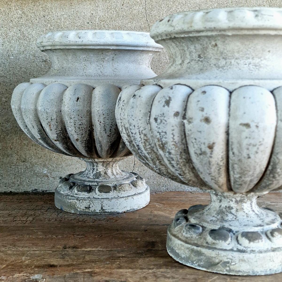 Pair of enameled cast iron planters