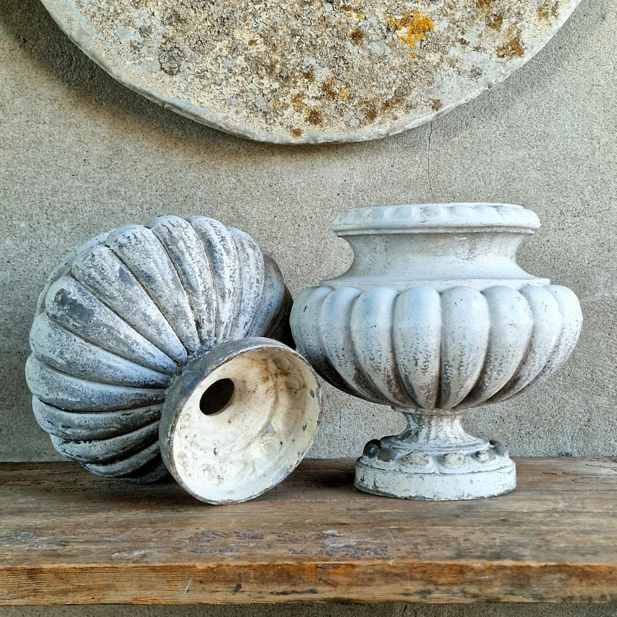 Pair of enameled cast iron planters