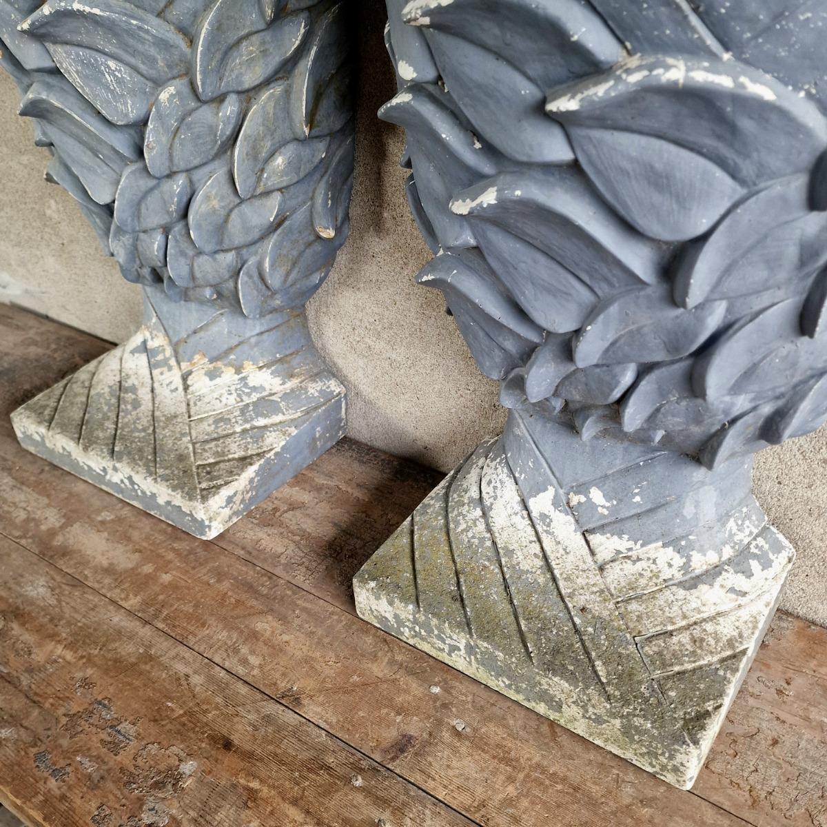Pair of enigmatic wall planters