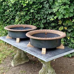 Pair of low cast iron planters