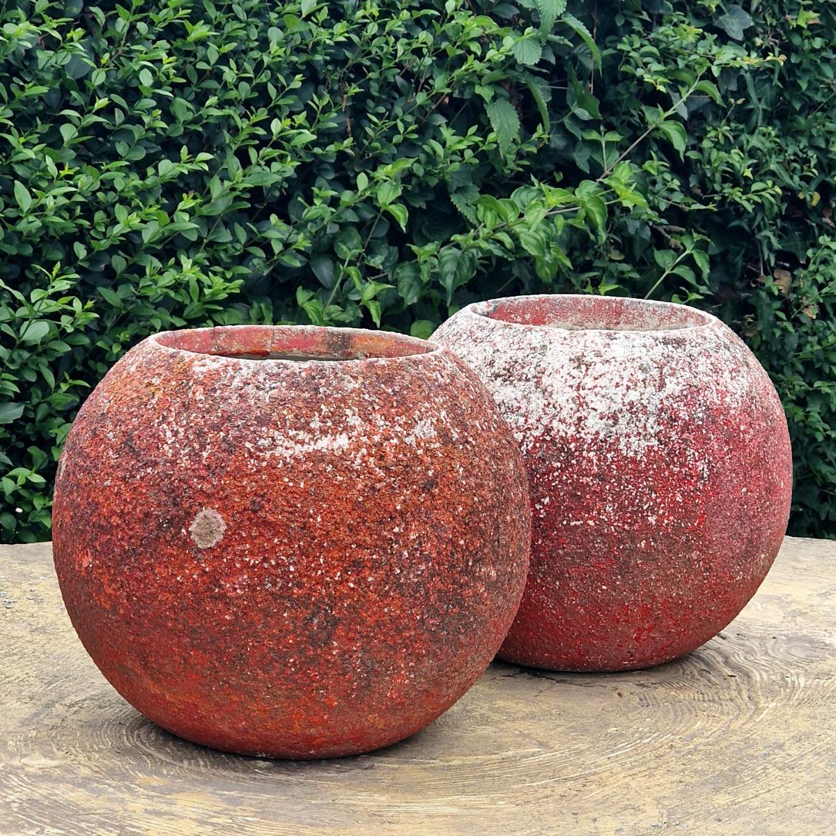 Pair of red sphere planters
