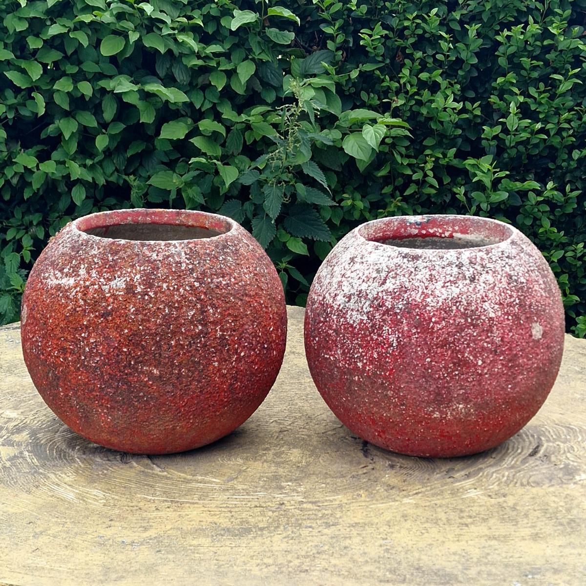 Pair of red sphere planters