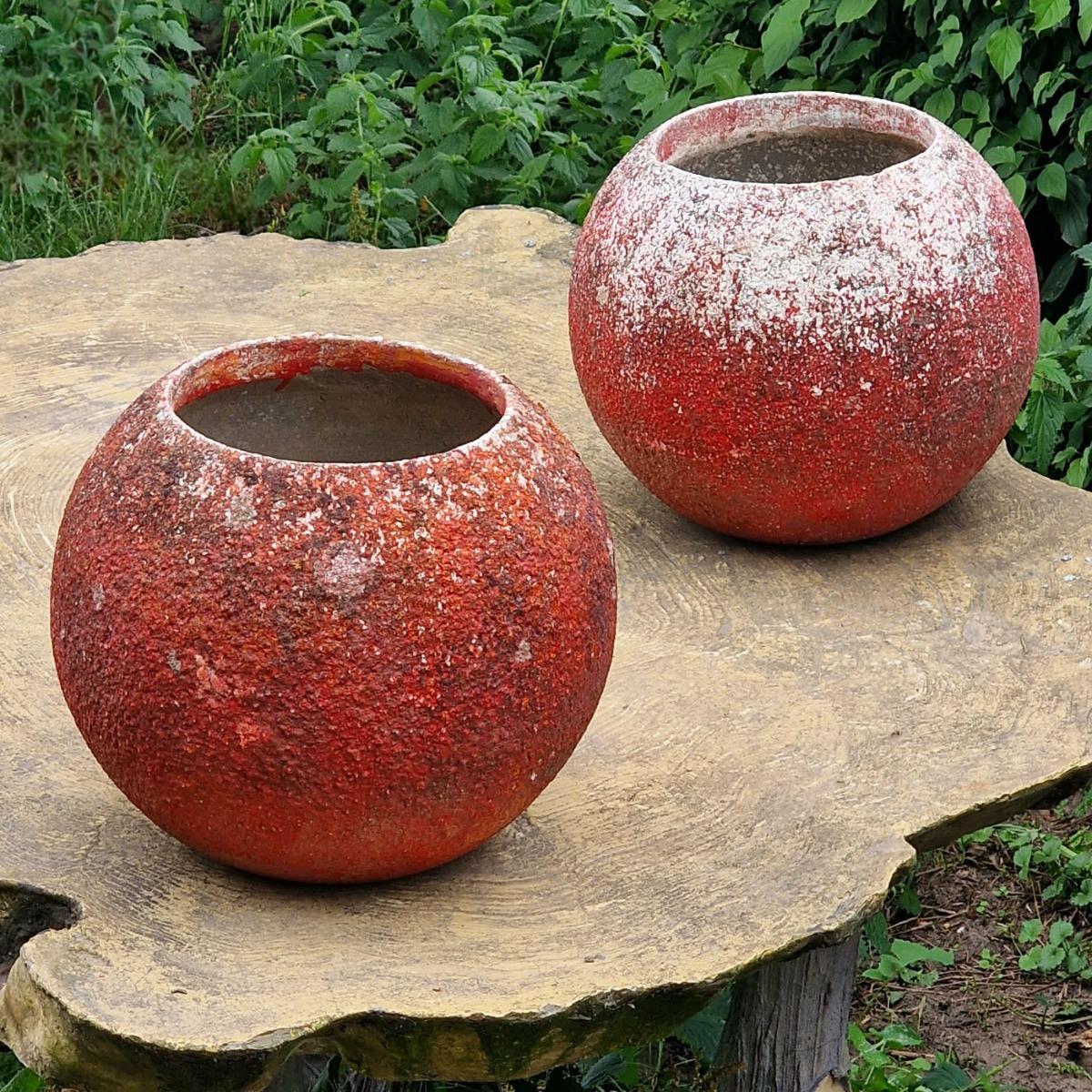 Pair of red sphere planters