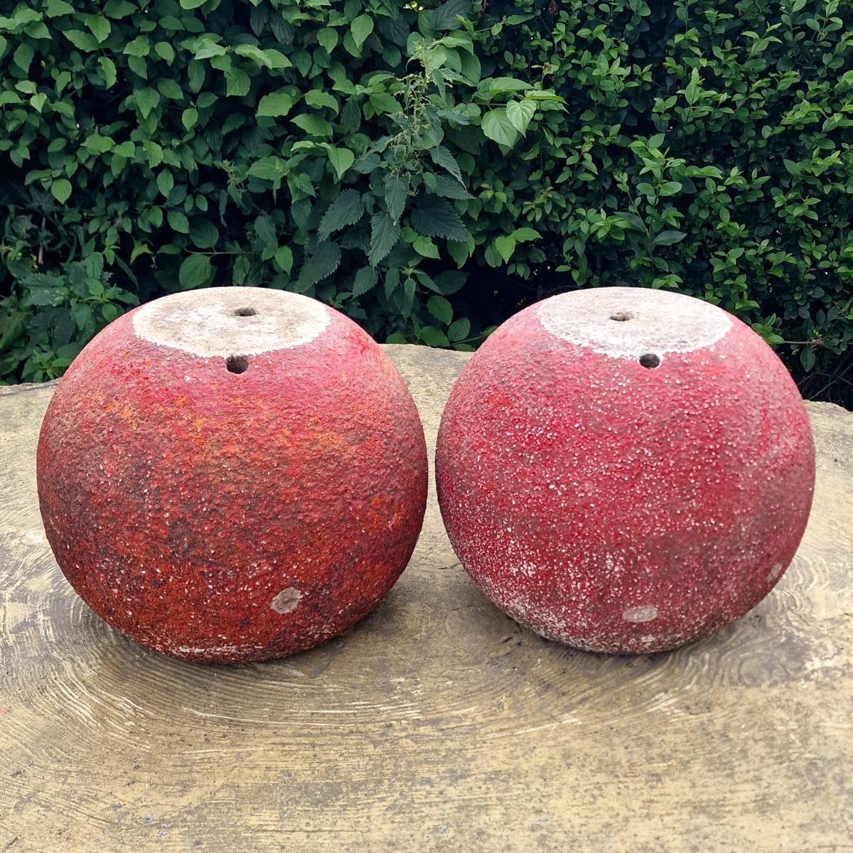 Pair of red sphere planters
