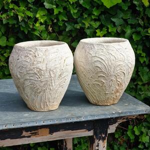 Pair of white cast stone planters