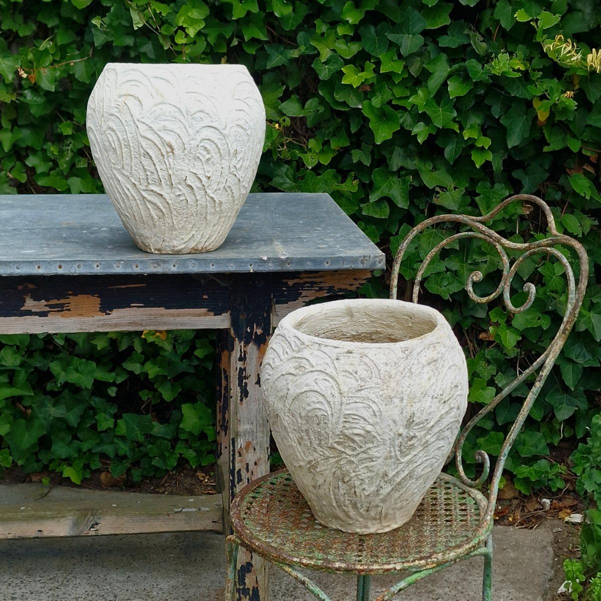 Pair of white cast stone planters
