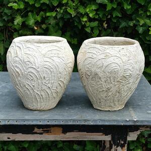 Pair of white cast stone planters